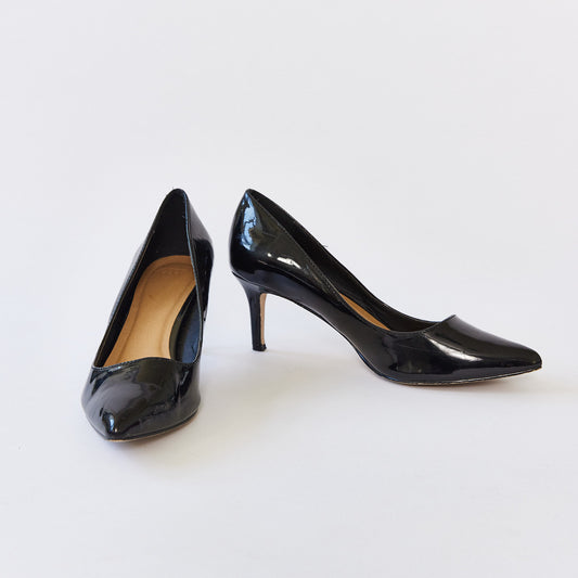 Black heeled pumps size 7